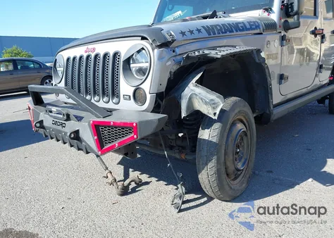 2015 Jeep Wrangler Unlimited Sport z USA, uszkodzony, nr VIN 1C4BJWDG7FL587014